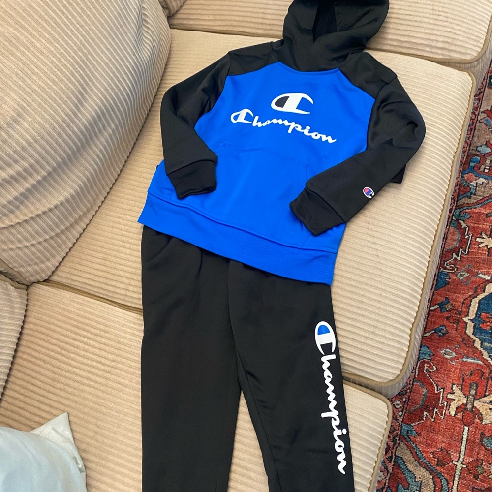 NWOT. Never worn. Champion sweatsuit. Size 5/6